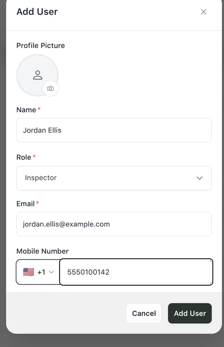 Add User dialog with the name Jordan Ellis, the Inspector role, an email address and a mobile number filled in